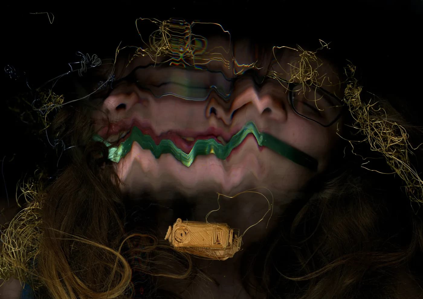 Scanner self portrait, face glitch-split with a monitoring device